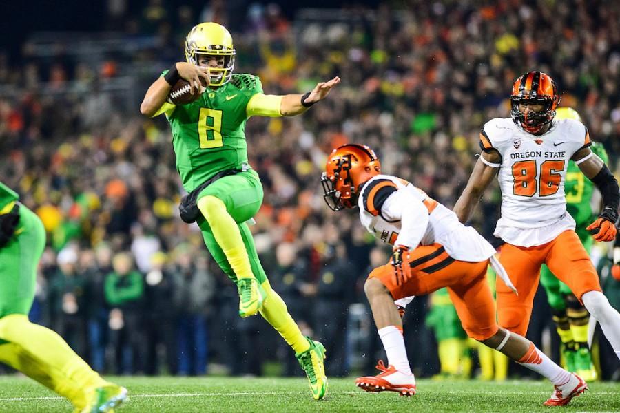 Marcus+Mariota+becomes+the+first+Heisman+Trophy+winner+to+come+from+the+state+of+Hawaii+and+the+University+of+Oregon.