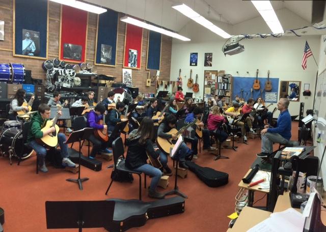 Students warm up in Mr. Wilds Beginning Guitar Class
