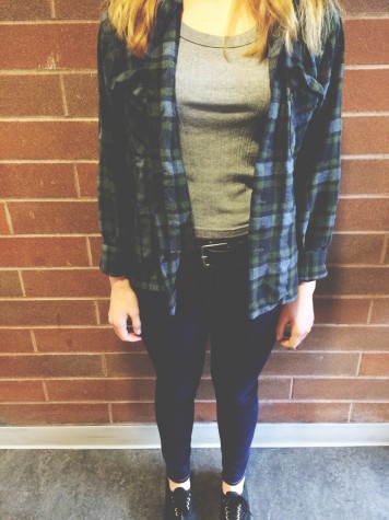 Freshman Allison Stewart wears jeans, a graphic tee with a flannel on top. The flannel completes this look that Ally is going for. This is just one of the many ways to wear a flannel. 