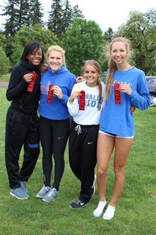 Track and Field Athletes Break Records, Depart for State