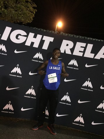 A picture from  Jesuit Twilight Relays of Kevin after beating the school triple jump record.