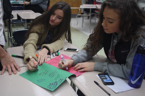 Elves Wrap Presents for Lot Whitcomb Families