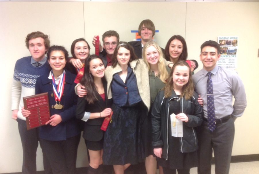 Members of the Speech and Debate team pose for a photo at the district tournament. Photo courtesy of Mr. Doran.