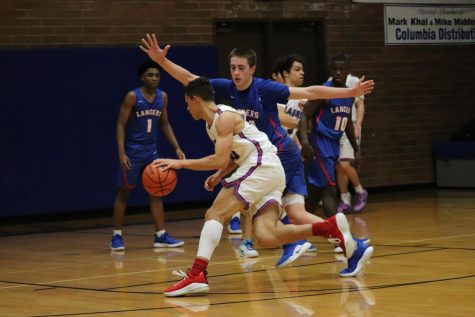 Winter Sports in Action: Boys Basketball Game vs. Churchill