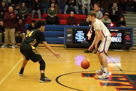Winter Sports in Action: #11 Varsity Boys Basketball Team Defeats #19 Milwaukie 65-50