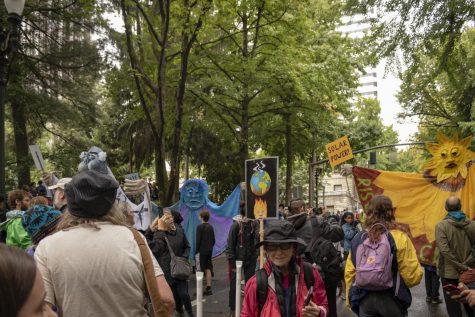 Thousands of activists gathered in Portland on Friday, Sept. 20, ditching school and work to demand action to address climate change.