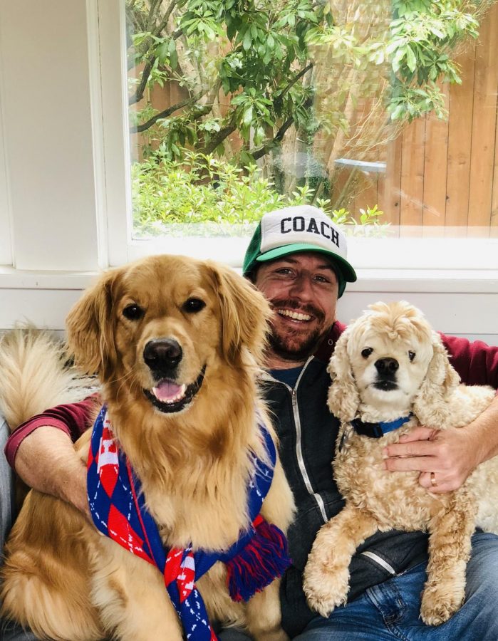 Mr. Seth Altshuler poses with his dogs, Larry and Doug.