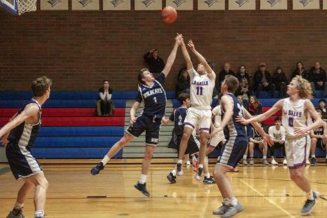 Varsity Boys Basketball Takes On Their Biggest Rival