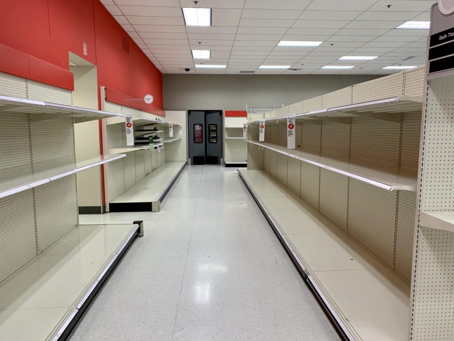 Aisles at Target Clackamas that were once fully stocked with paper products now sit completely empty.