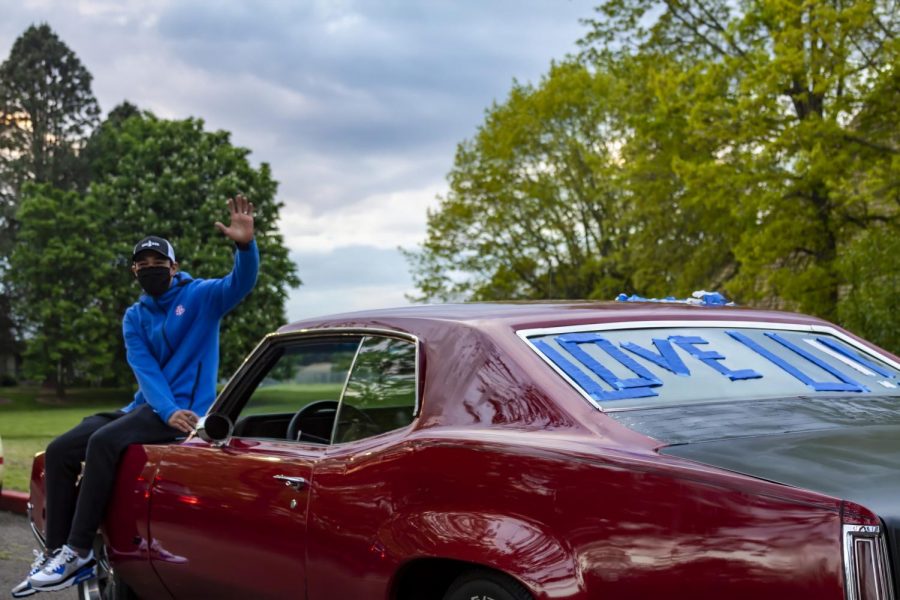 Mr. Yoshihara waved to students from his car during the “Be The Light” event that took place in the spring of 2020.