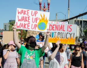 Many students at the march held signs protesting the inaction of political leaders on climate change.