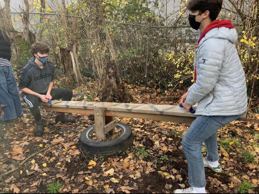 Sophomore Luke Martin and Sophomore Andrew Keller played on the seesaw at Zenger Farms.