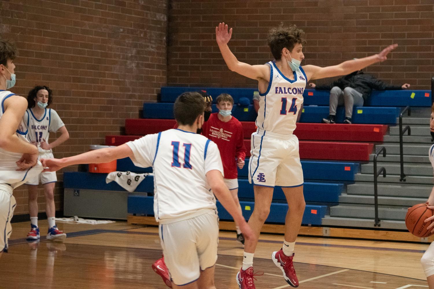Leaping+Back+Into+Action%3A+La+Salle+Boys+Basketball+Takes+On+West+Linn