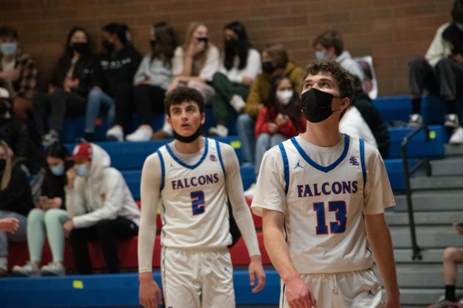 La Salle’s varsity basketball team warms up before Friday’s game against West Linn - their first home game in 24 days.