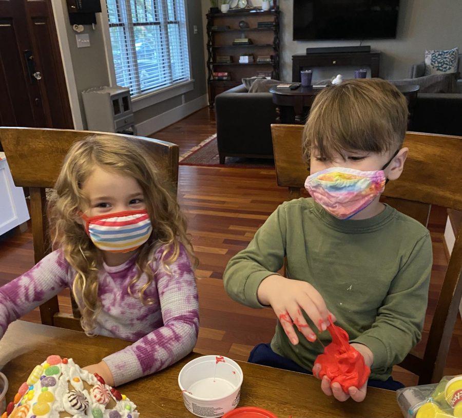 My four-year-old sister, Emery Eldon, wears a mask when hanging out with one of her friends.