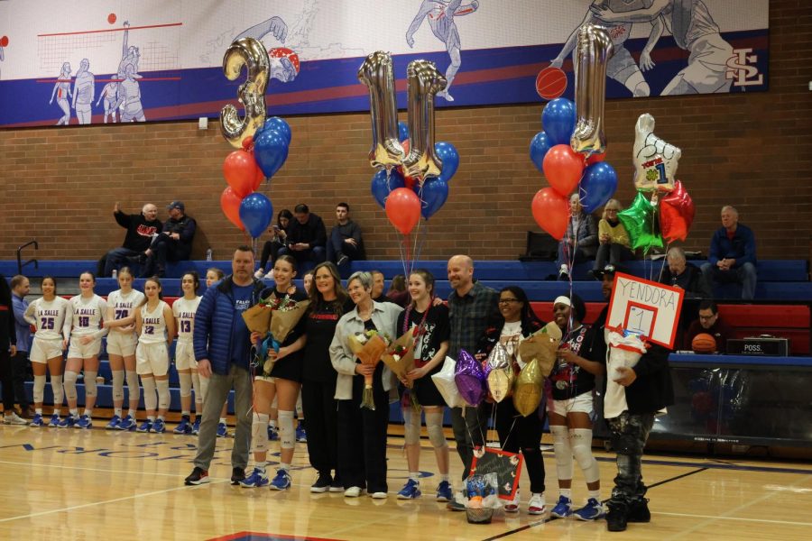 The three seniors were honored before the game along with their families.