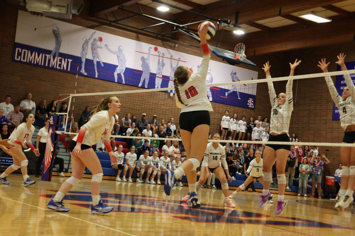 On Tuesday, Sept. 19, La Salle varsity volleyball fell to rival Wilsonville, with a final score of 2-3. 
