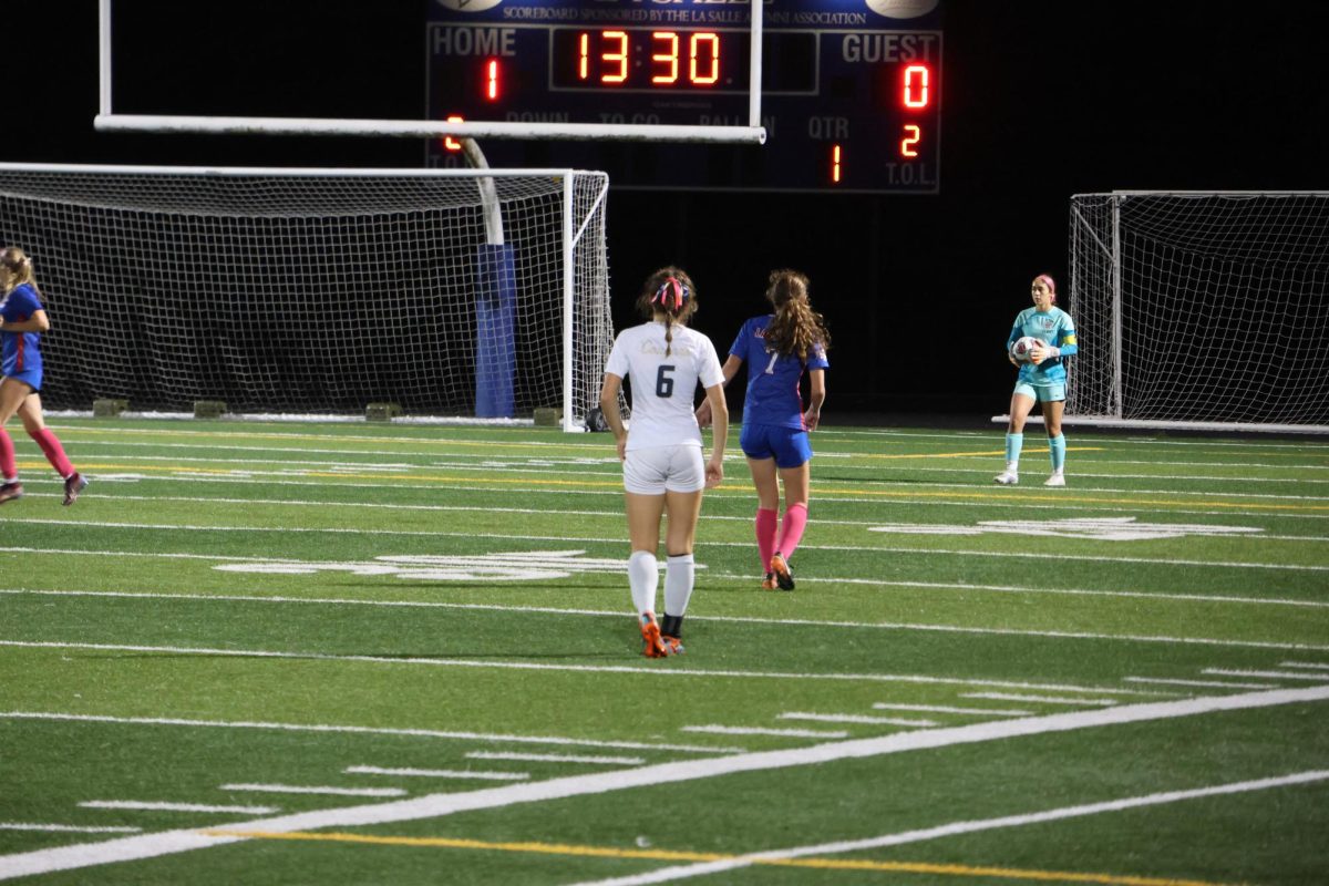 Junior+Brooke+Wilkinson%2C+along+with+an+opponent%2C+walks+towards+the+Canby+goalie+in+anticipation+for+her+throw-in.