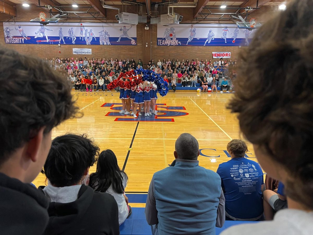  A view from the bleachers of the cheer teams performance during the homecoming pep rally on Thursday, Oct. 5th. 