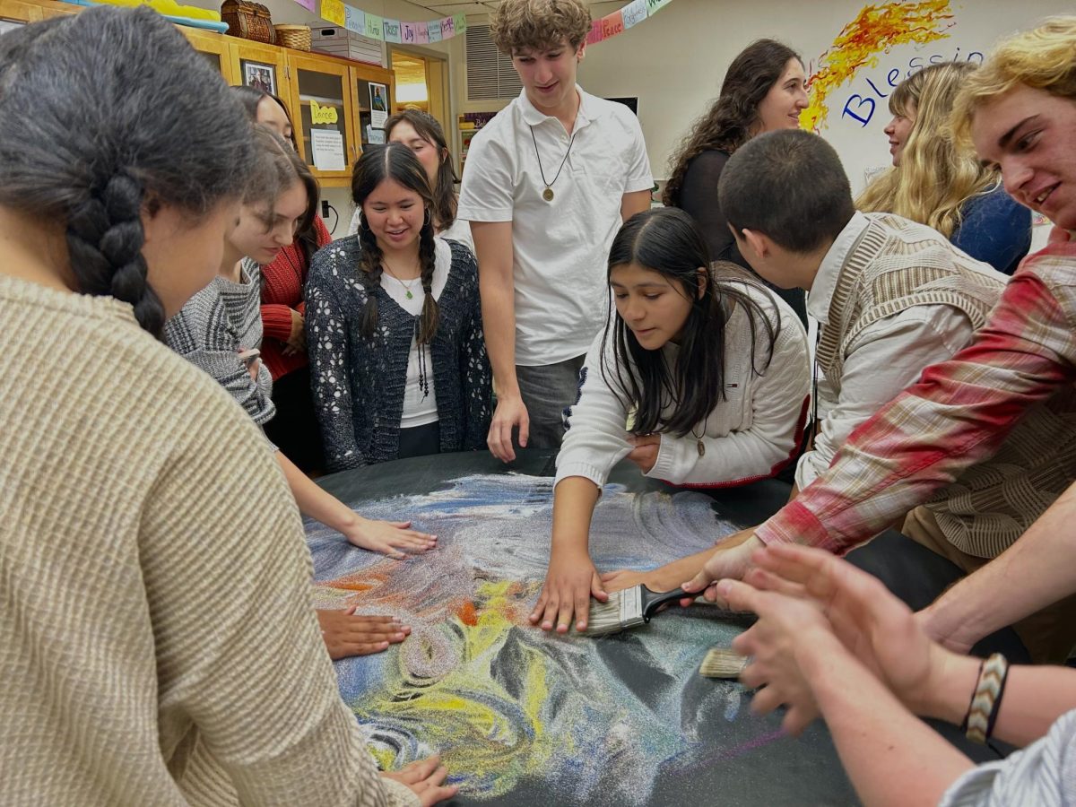 Students in Mr. Mac’s seventh period World Religions class destroyed a sand mandala they created as part of a mindfulness activity on Wednesday Nov 15.