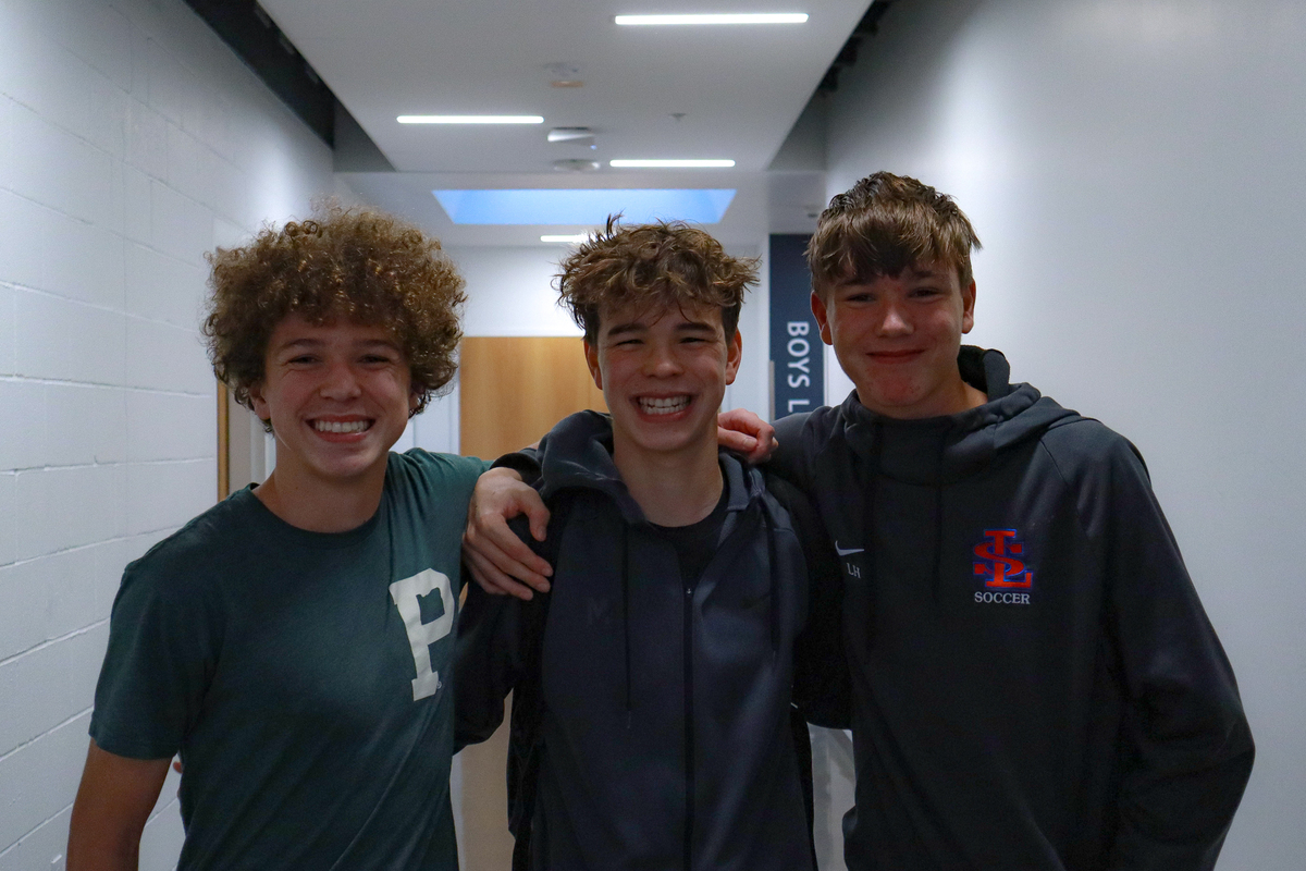 For Nick, Jackson, and Luke Hawkins, from left to right, their relationship as triplets is akin to having two built-in best friends. “[We have] different personalities, but we share the same friend group,” Luke said. “It’s kind of fun.”