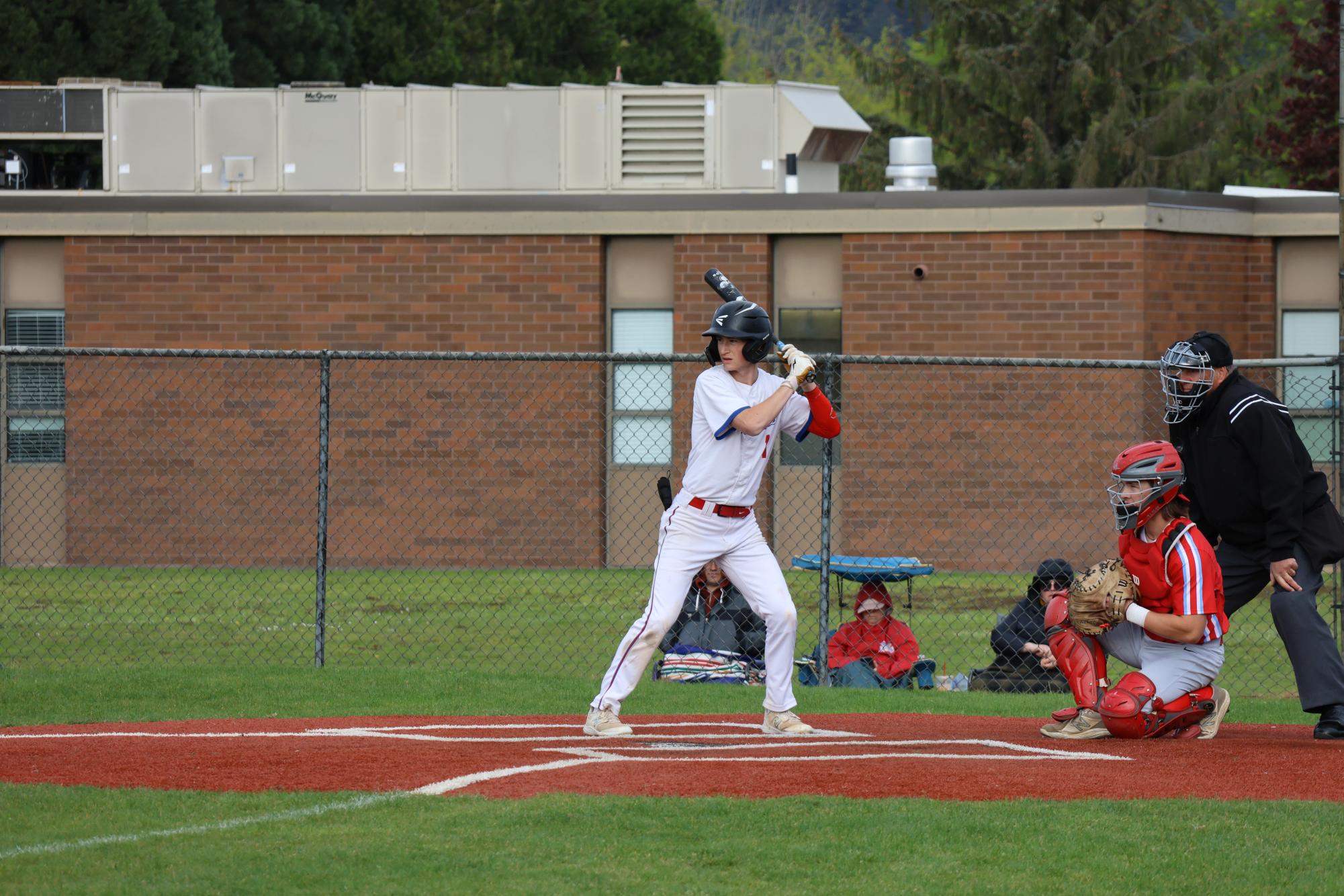 Photo Story: Varsity Baseball Overcomes Centennial 11–10