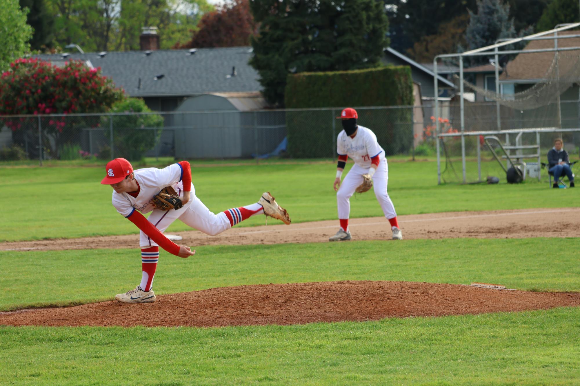 Photo Story: Varsity Baseball Overcomes Centennial 11–10