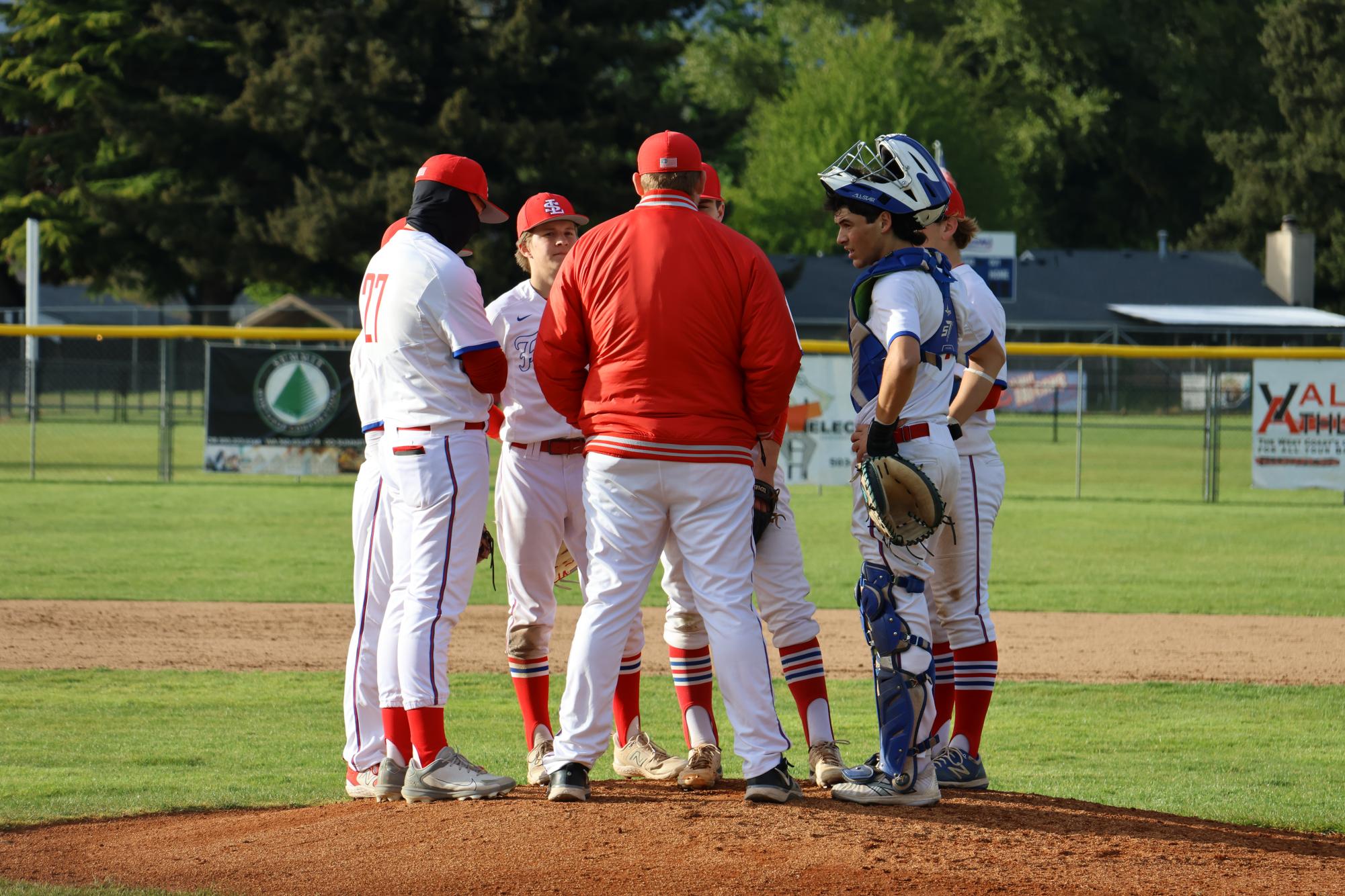 Photo Story: Varsity Baseball Overcomes Centennial 11–10