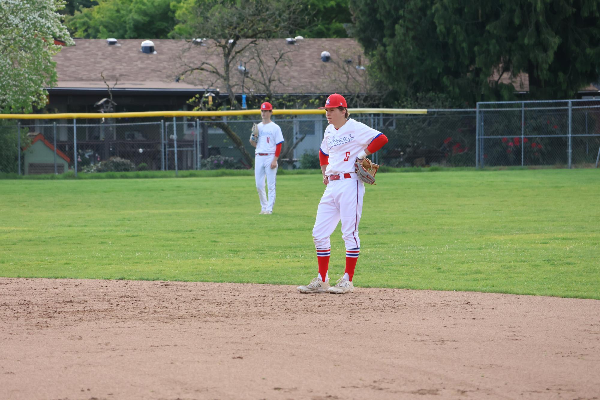 Photo Story: Varsity Baseball Overcomes Centennial 11–10