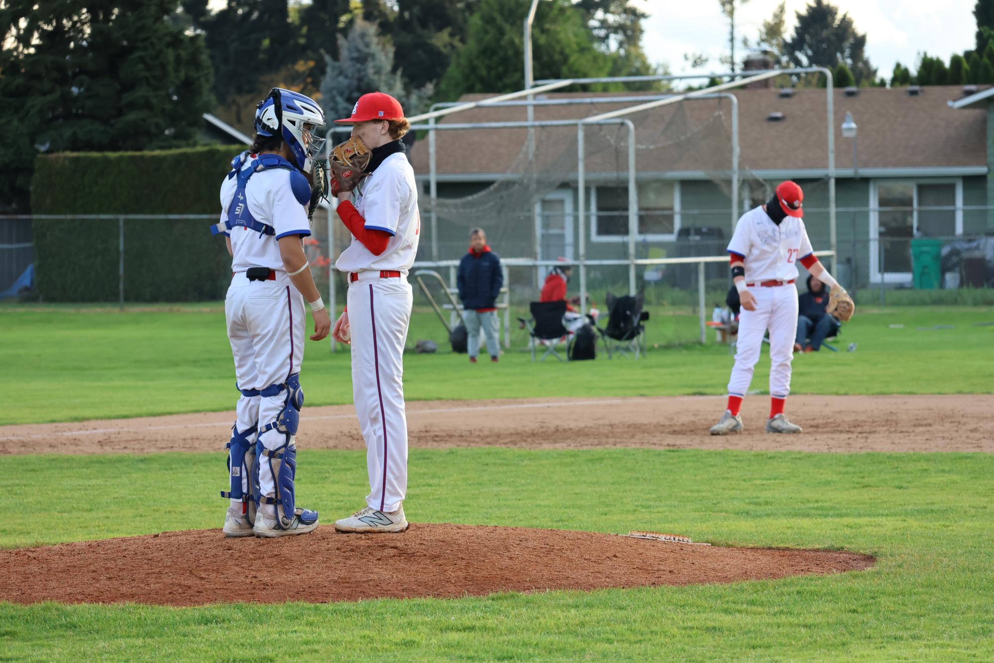 Photo Story: Varsity Baseball Overcomes Centennial 11–10