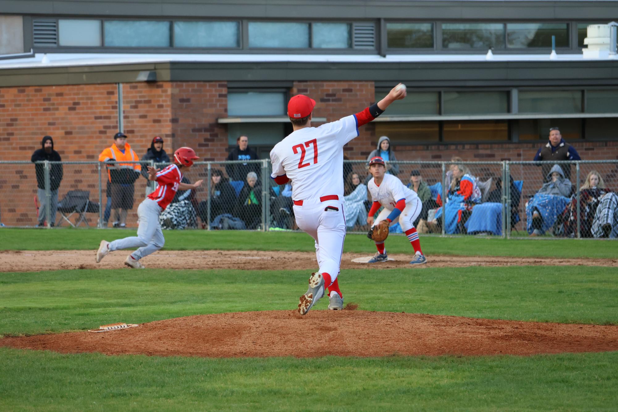 Photo Story: Varsity Baseball Overcomes Centennial 11–10