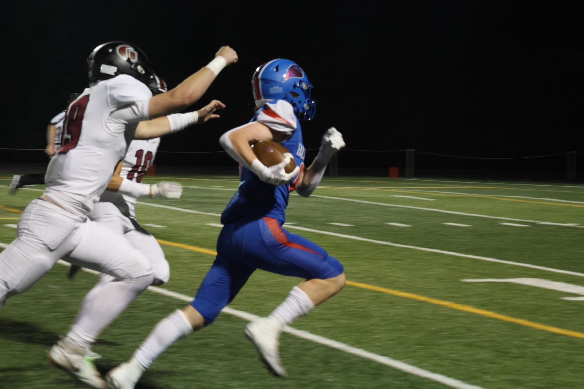 Photo Story: Varsity Football Team Loses Home Game to Glencoe, 20-27