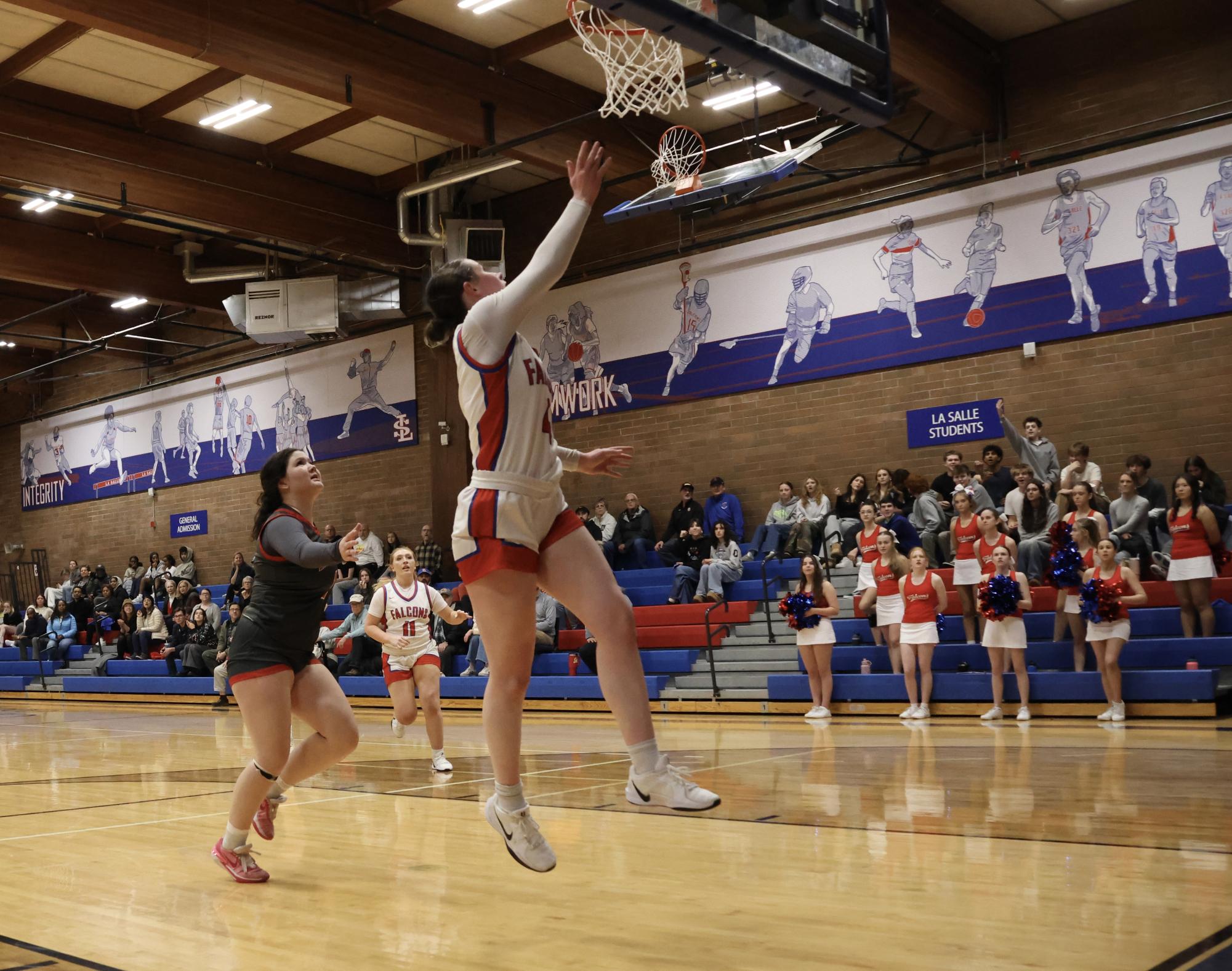 Photo Story: Girls Basketball Starts the Season Off With a Win Against North Eugene