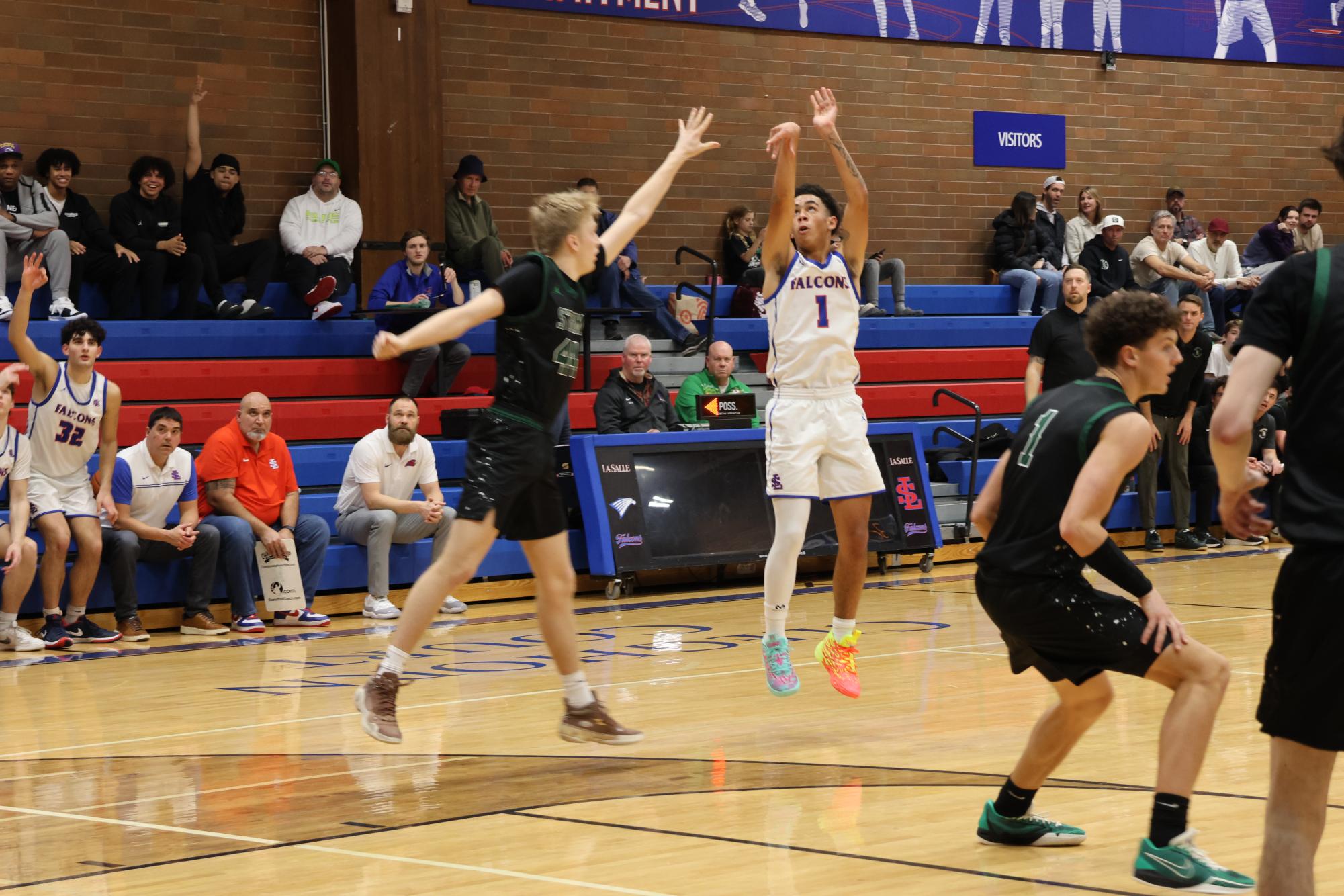 Photo Story: Boys Basketball Defends The Nest Against Summit