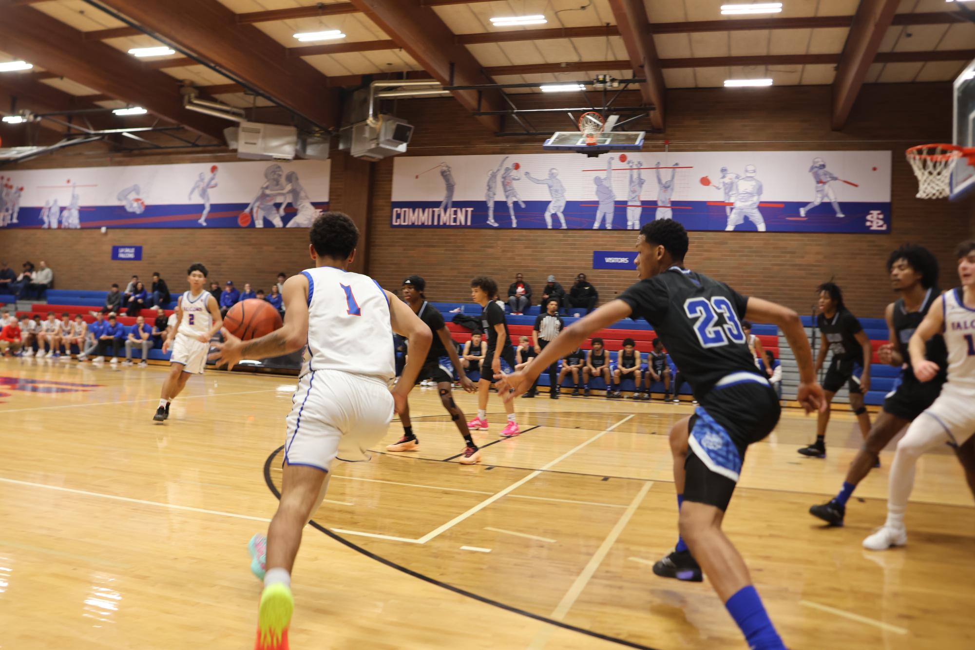 Photo Story: Boys Basketball Hosts Oakland in Opener