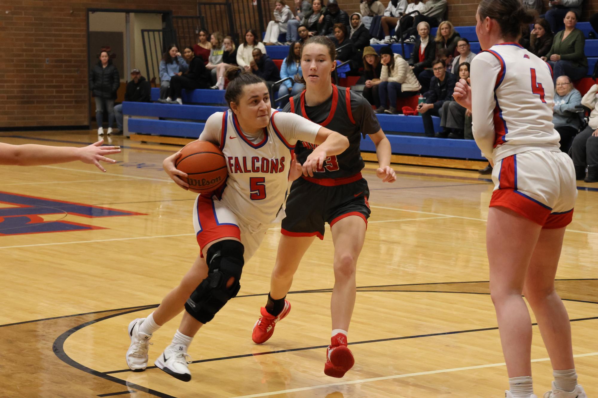 Photo Story: Girls Basketball Starts the Season Off With a Win Against North Eugene