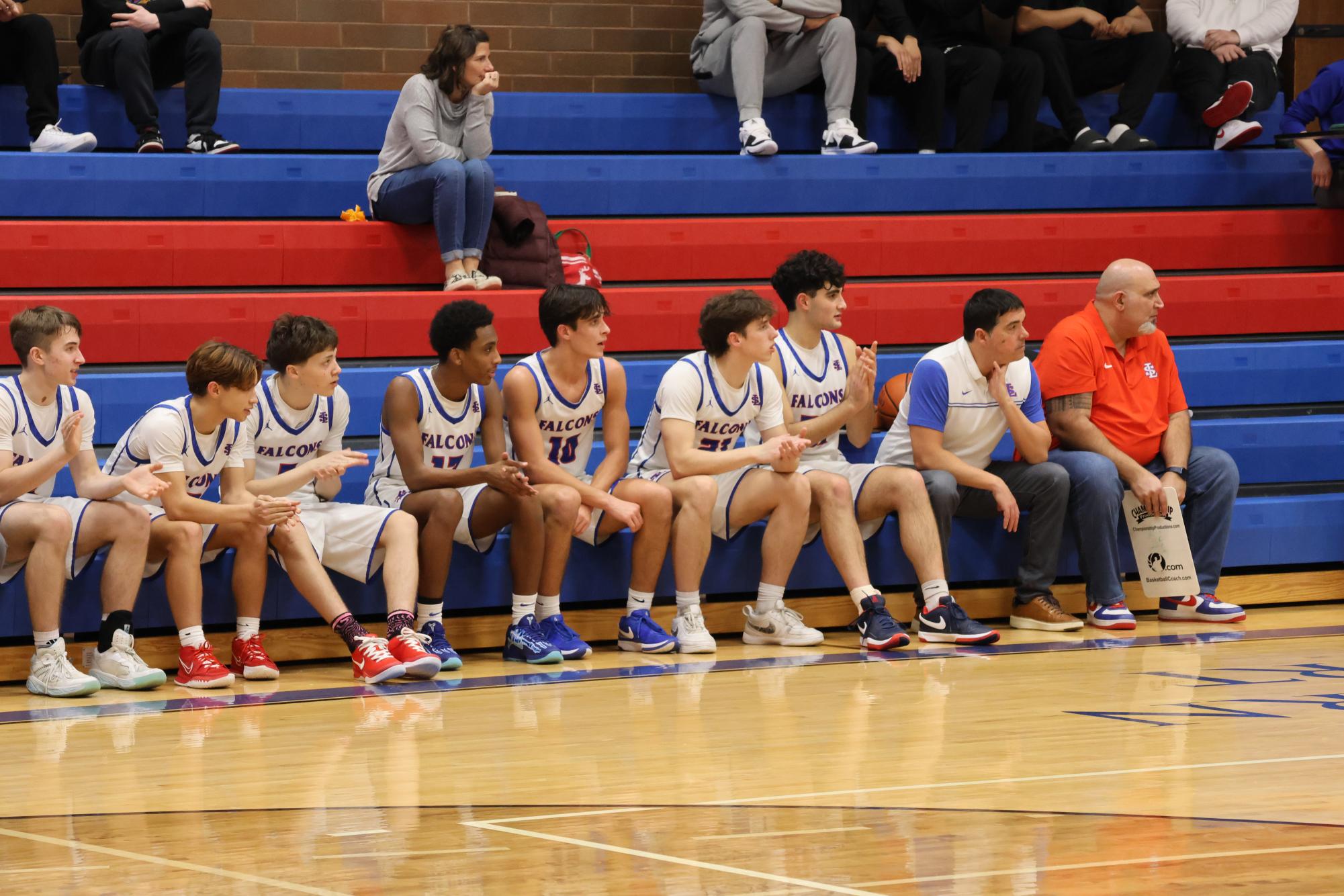 Photo Story: Boys Basketball Defends The Nest Against Summit