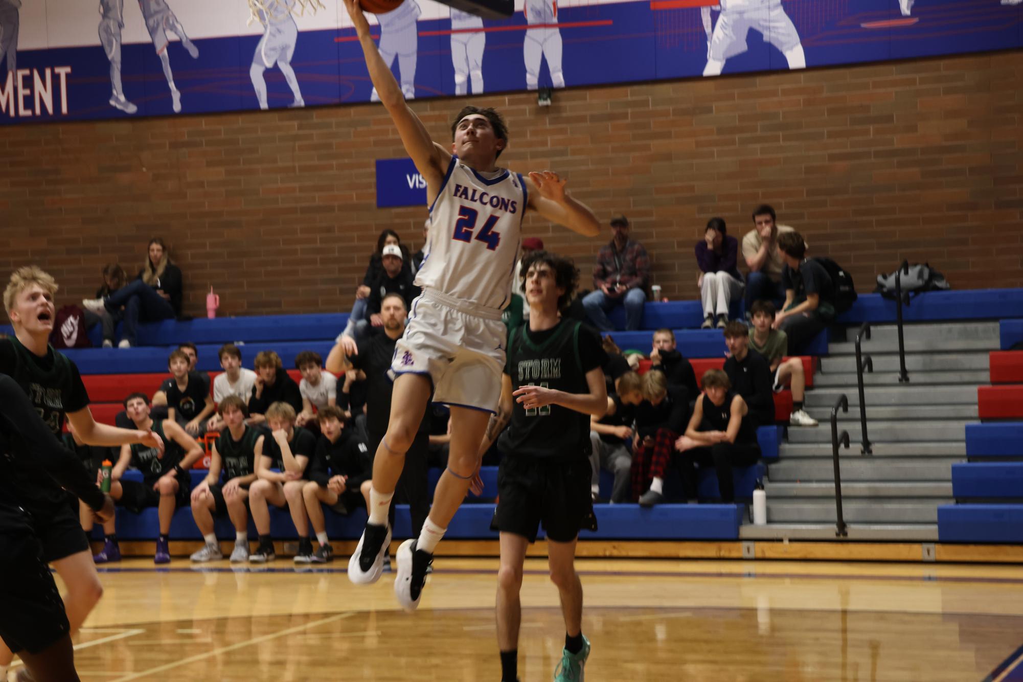 Photo Story: Boys Basketball Defends The Nest Against Summit