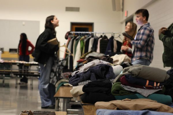 Students shop at La Salle’s flea market, aiding their wallets, closets, and the environment.