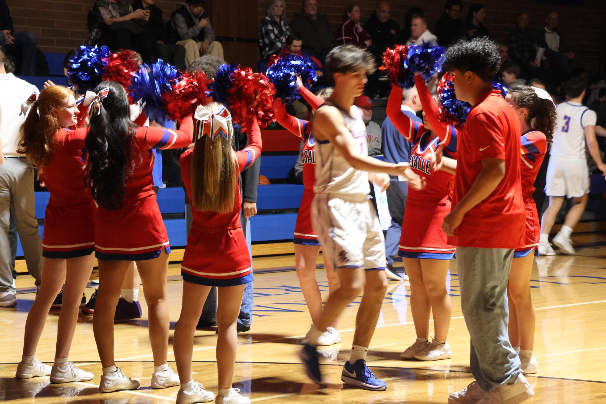 Photo Story: Boys Basketball Defends the Nest Against Rex Putnam