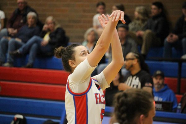 One of senior Lindsey Kapanoske’s greatest passions is basketball, and, in her free time, she likes to relax on her bed with her dog watching the sport. 