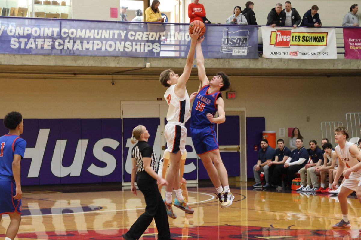 Varsity boys basketball played Caldera High School following a first round matchup against Woodburn High School on Saturday, March 8, where they won 63-48.