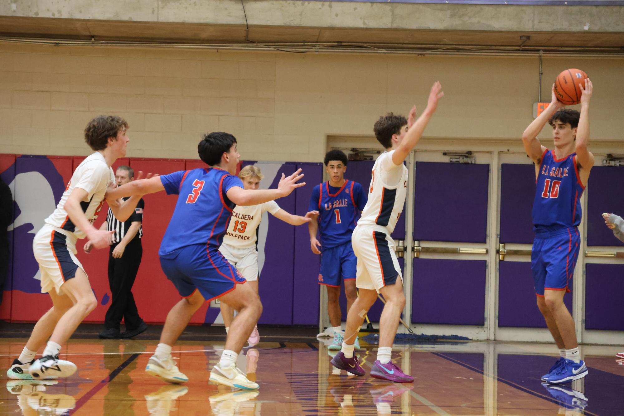 Photo Story: Falcons' Boys Basketball Fly Past First Seed Caldera