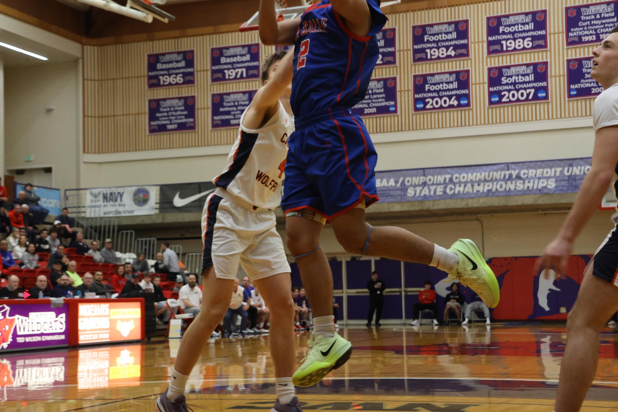 Photo Story: Falcons' Boys Basketball Fly Past First Seed Caldera