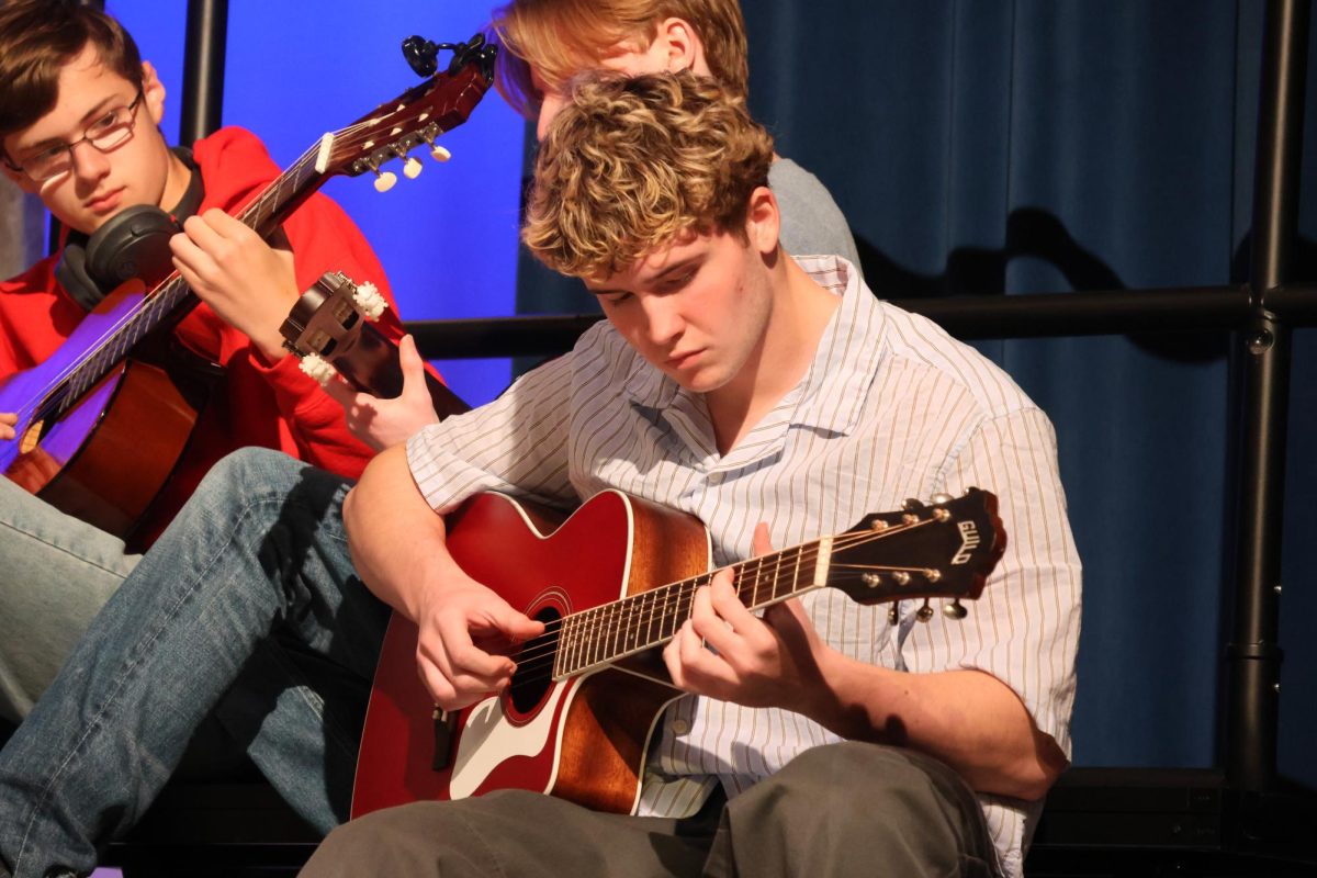 Junior Eli Gindraux, a member of La Salle’s Advanced Guitar class, performed during Flex Time on Wednesday, May 21, when students attended performances from the band, choir, and guitar classes.