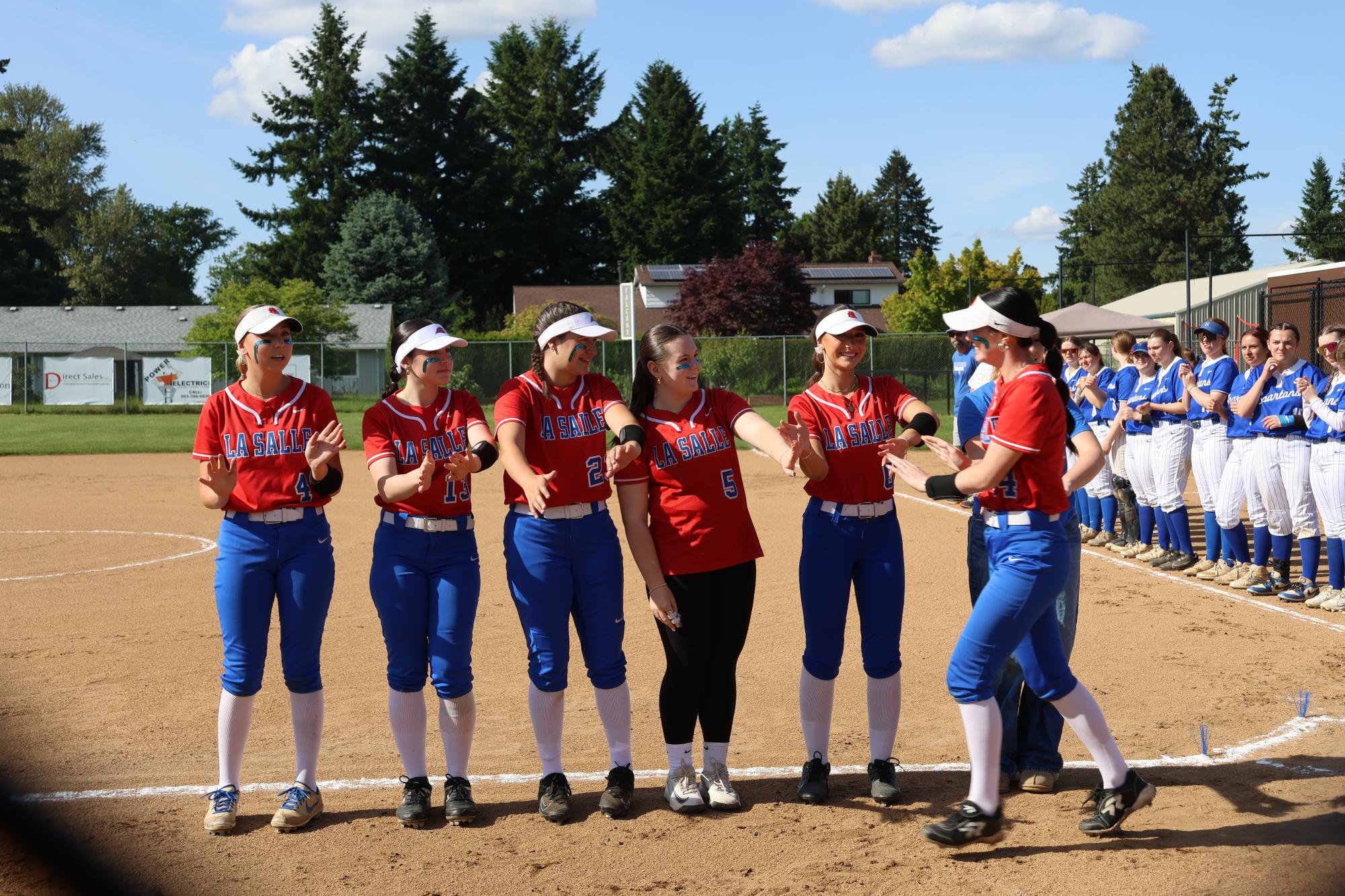 Photo Story: Varsity Softball Snags a Close Win Against Hillsboro on Senior Night, 11–10