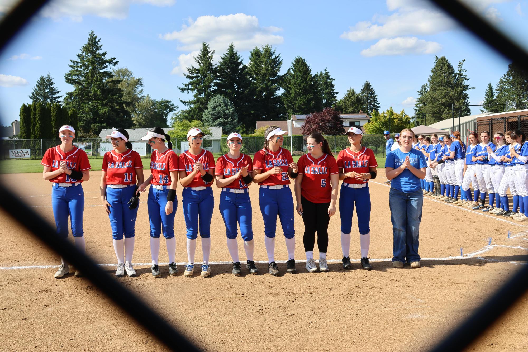 Photo Story: Varsity Softball Snags a Close Win Against Hillsboro on Senior Night, 11–10