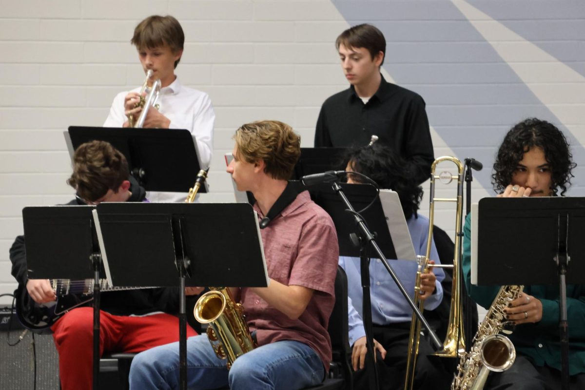 Students concentrate on their sheet music moments before taking the stage for their spring concert on Wednesday, May 21.