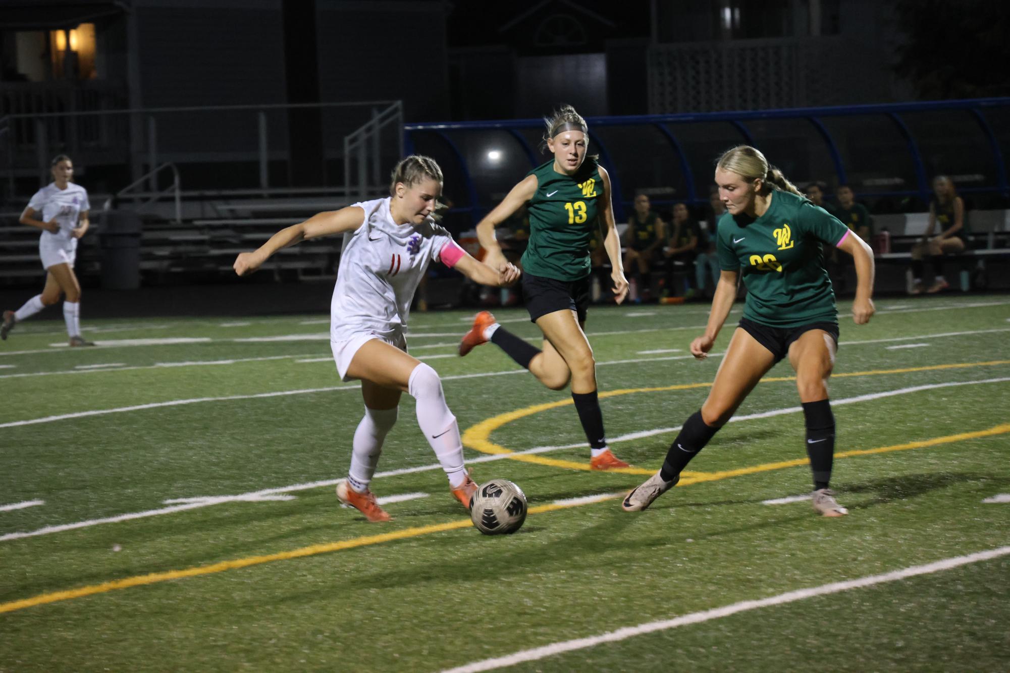 Photo Story: Girls Soccer Falters in their First Game, Losing 4-2