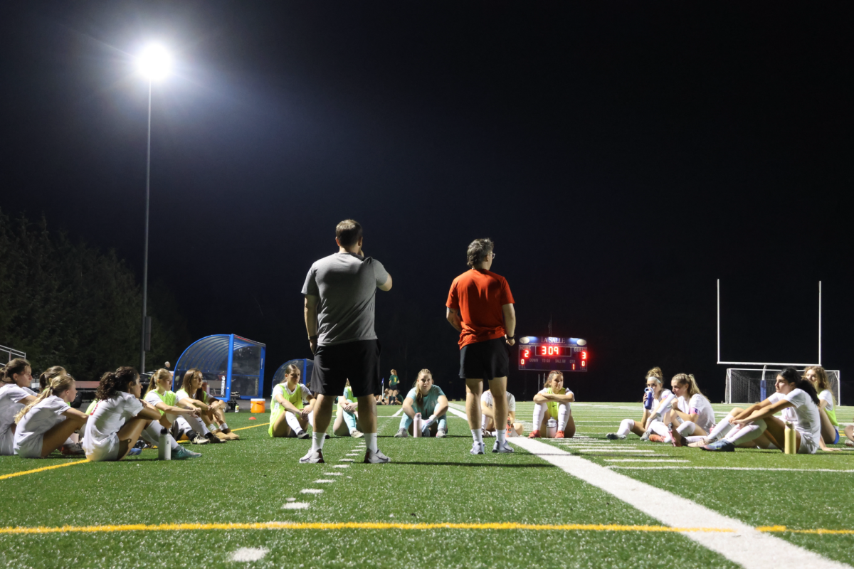 During halftime, the La Salle girl’s varsity soccer team receives a team talk from their coaches while trailing 3-2 against West Linn High School on Thursday, Sept. 4.